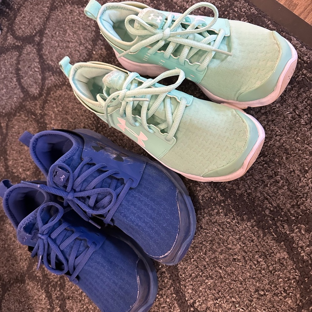 2 pairs of under armour sneakers, used but very good condition